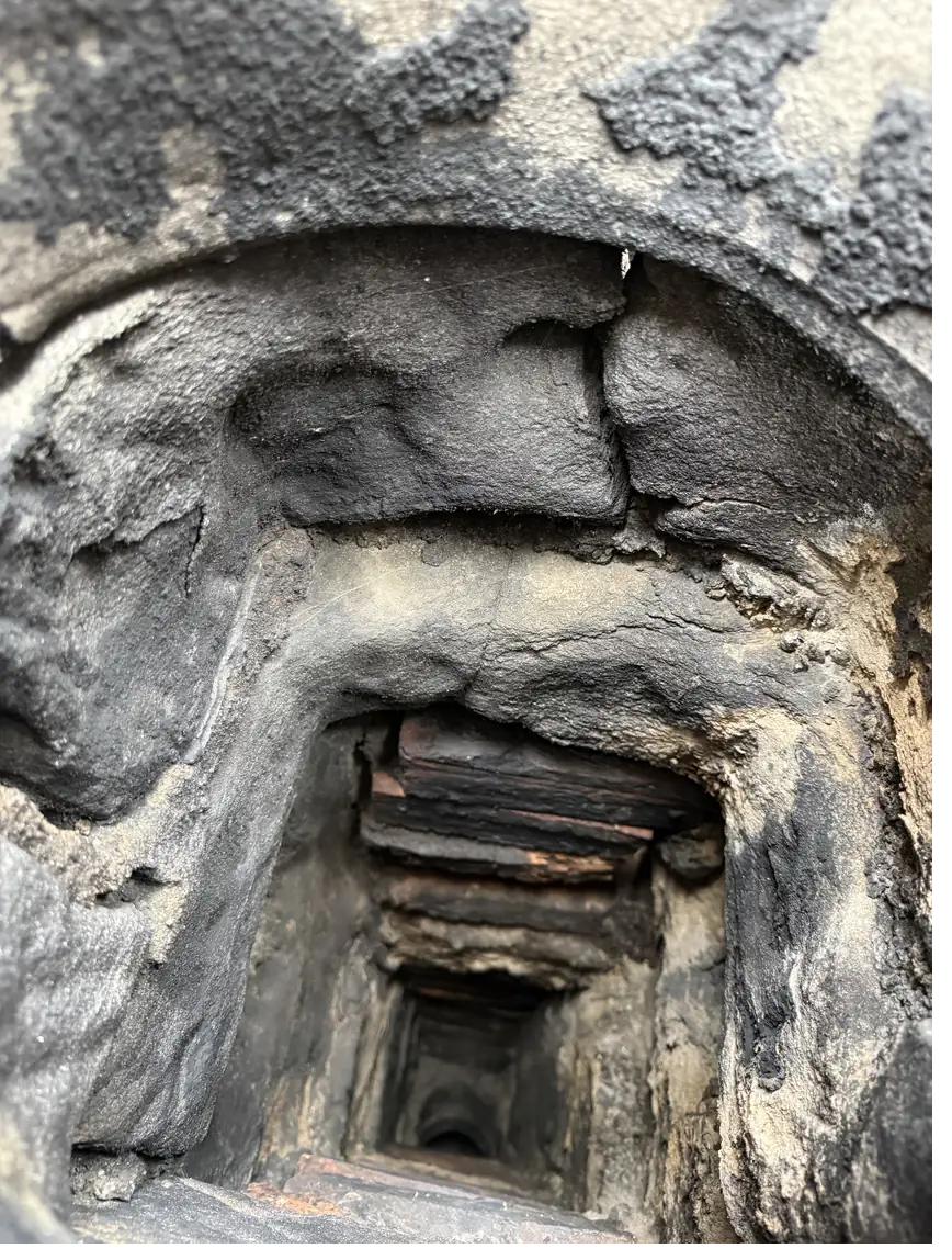 Deposits and mortar loss in an unlined brick flue